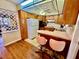 Well-lit kitchen with a breakfast bar at 302 Luna Rd, Auburndale, FL 33823