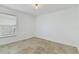 Bedroom features light tile floors and a bright window at 307 Balmoral Ct, Davenport, FL 33896