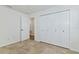 Bedroom featuring tile floors, closet and ensuite bathroom at 307 Balmoral Ct, Davenport, FL 33896