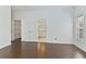 Bedroom featuring wood floors, walk-in closet and an ensuite bathroom at 307 Balmoral Ct, Davenport, FL 33896