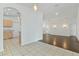 Well-lit kitchen with tile flooring, stainless steel appliances, and easy access to the living spaces at 307 Balmoral Ct, Davenport, FL 33896