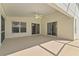 Spacious covered patio perfect for entertaining or relaxing outdoors at 307 Balmoral Ct, Davenport, FL 33896