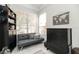 Bright bedroom with a futon, providing a flexible space for relaxation and work at 3071 Shoal Creek Village Dr, Lakeland, FL 33803