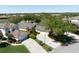 Well-maintained home featuring mature landscaping and an expansive driveway leading to a multi-car garage at 3071 Shoal Creek Village Dr, Lakeland, FL 33803