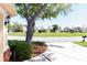 Exterior of home with a well-maintained front lawn and mature trees overlooking a green neighborhood at 3071 Shoal Creek Village Dr, Lakeland, FL 33803