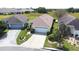 A well-manicured lawn and mature landscaping surround this home at 3080 Westmoreland Dr, Lakeland, FL 33810