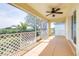 Enjoy outdoor living on this screened lanai with a ceiling fan and views of the lush, mature landscaping at 3080 Westmoreland Dr, Lakeland, FL 33810