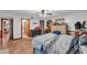 Inviting bedroom boasting a large bed, ceiling fan, and tile floor, providing a comfortable space at 3530 Hamilton Rd, Lakeland, FL 33811