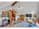 Unique bedroom space with sloped ceiling, carpeting, and ceiling fan at 3530 Hamilton Rd, Lakeland, FL 33811