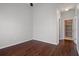 Bedroom with hardwood floors and view of the doorway and closet at 4227 Hartridge Ln, Lakeland, FL 33813