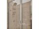 Shower with tiled walls and glass door at 4232 Prima Lago Dr, Lakeland, FL 33810