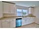 Functional kitchen with granite counters, stainless steel appliances, and ample cabinet space at 4322 Juliana Lake Dr, Auburndale, FL 33823
