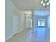 Inviting living room with neutral tones, tile floors, and ample natural light at 4322 Juliana Lake Dr, Auburndale, FL 33823