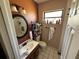 Full bathroom featuring a mirror, vanity, and tile flooring at 460 W Pierce St, Lake Alfred, FL 33850