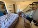 Bedroom featuring neutral tile flooring and filled with toys at 460 W Pierce St, Lake Alfred, FL 33850