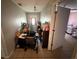 Hallway leading to front door and other rooms in the house at 460 W Pierce St, Lake Alfred, FL 33850