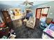 Open floor plan with living room and kitchen offering space and light at 460 W Pierce St, Lake Alfred, FL 33850