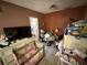 Main bedroom with a neutral color palette and tile flooring at 460 W Pierce St, Lake Alfred, FL 33850