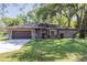 Charming single story home with a well-manicured lawn and attached two car garage at 530 Heather Ct, Bartow, FL 33830