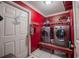 Functional laundry room with modern washer and dryer on a platform, plus storage at 530 Heather Ct, Bartow, FL 33830