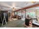 The spacious sun room offers a relaxed atmosphere with access to the backyard at 530 Heather Ct, Bartow, FL 33830