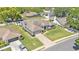Aerial view of well-maintained landscaped home with large yard and driveway at 5638 Bloomfield Blvd, Lakeland, FL 33810
