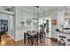 The dining room is well lit and has a large table with seating for six at 5638 Bloomfield Blvd, Lakeland, FL 33810