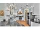 Modern kitchen boasts granite countertops, stainless steel appliances, and pendant lighting at 5638 Bloomfield Blvd, Lakeland, FL 33810