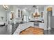 Well-lit kitchen with stainless steel appliances, granite countertops, and breakfast bar seating at 5638 Bloomfield Blvd, Lakeland, FL 33810