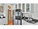 Well-equipped kitchen featuring stainless steel appliances, granite countertops, and a pantry at 5638 Bloomfield Blvd, Lakeland, FL 33810