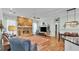 Inviting living room with a brick fireplace, hardwood floors, and plenty of natural light at 5638 Bloomfield Blvd, Lakeland, FL 33810