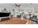 Bright open-plan living area seamlessly connects to kitchen and dining spaces at 5638 Bloomfield Blvd, Lakeland, FL 33810