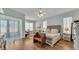 Spacious main bedroom features hardwood floors, lots of natural light, and neutral decor at 5638 Bloomfield Blvd, Lakeland, FL 33810