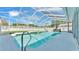 Gorgeous screened-in pool with a spa and plenty of room for lounge chairs at 5638 Bloomfield Blvd, Lakeland, FL 33810