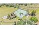 Aerial view of community tennis courts with beautiful palms at 5638 Bloomfield Blvd, Lakeland, FL 33810
