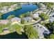 Aerial view of a home with a lake view in a beautiful neighborhood at 5789 Lake Victoria Dr, Lakeland, FL 33813