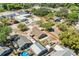 An aerial view showing the single Gathering home and some surrounding commercial properties at 627 N Gary Rd, Lakeland, FL 33801