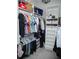 Walk-in closet with adjustable shelving, drawers, and ample hanging space to provide excellent storage at 6470 Ashley Dr, Lakeland, FL 33813