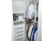 Walk-in closet with ample shelving and hanging storage at 6470 Ashley Dr, Lakeland, FL 33813