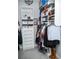 Walk-in closet with adjustable shelving, drawers, and ample hanging space to provide excellent storage at 6470 Ashley Dr, Lakeland, FL 33813
