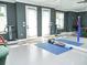 Spacious exercise room with mirrored wall and fitness equipment at 6470 Ashley Dr, Lakeland, FL 33813