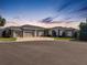 Charming home with manicured lawn, beautiful landscaping, and a spacious driveway at 6470 Ashley Dr, Lakeland, FL 33813
