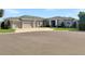 Inviting single-Gathering home with well-maintained landscaping and a spacious driveway at 6470 Ashley Dr, Lakeland, FL 33813