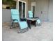 This outdoor patio is furnished with comfortable seating for relaxation and enjoying the outdoor space at 6470 Ashley Dr, Lakeland, FL 33813