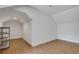 Bonus room featuring wood-look tile flooring and shelving at 6704 Crescent Lake Dr, Lakeland, FL 33813