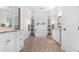 Beautiful bathroom with dual vanities, a soaking tub, and spa-like finishes at 6745 Old Melbourne Hwy, St Cloud, FL 34771