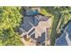 Aerial view of the property highlighting the home's layout, screened pool, and surrounding landscape at 6774 Crescent Woods Cir, Lakeland, FL 33813