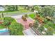 Open gated community entrance with brick walls and landscaping and brick planter at 6774 Crescent Woods Cir, Lakeland, FL 33813