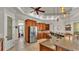 Spacious kitchen featuring granite countertops, breakfast bar, and stainless steel appliances at 6774 Crescent Woods Cir, Lakeland, FL 33813
