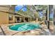 Stunning screened-in pool and patio area with outdoor kitchen offers a luxurious outdoor living experience at 6774 Crescent Woods Cir, Lakeland, FL 33813